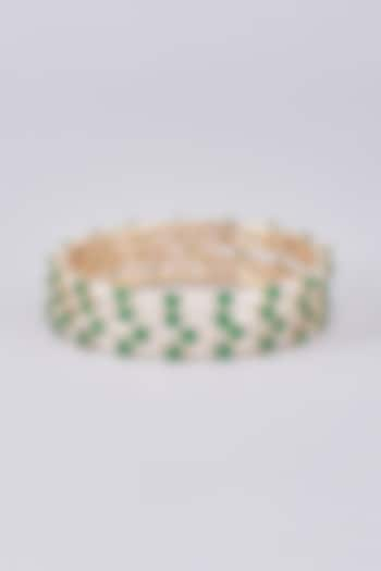 Gold Finish Emerald Bangles (Set Of 4) by Saga Jewels at Pernia's Pop Up Shop