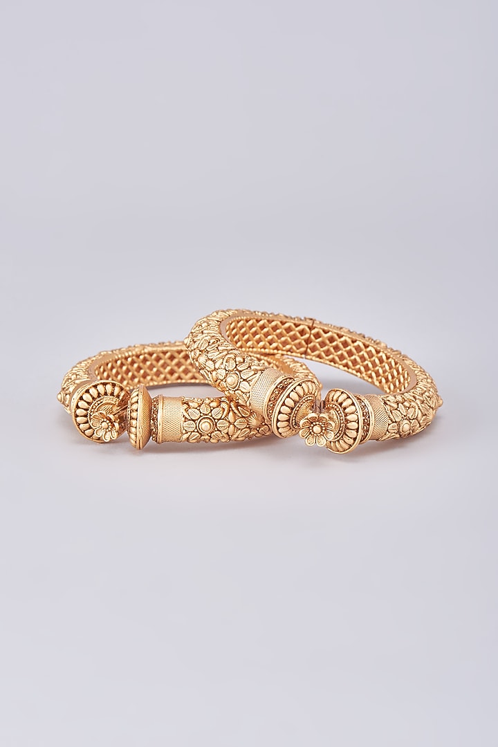 Gold Finish Temple Bangles (Set Of 2) by Saga Jewels at Pernia's Pop Up Shop
