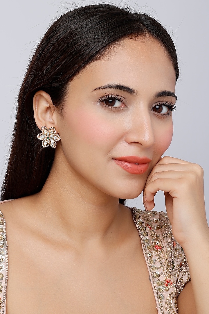 Gold Finish Floral Stud Earrings by Saga Jewels