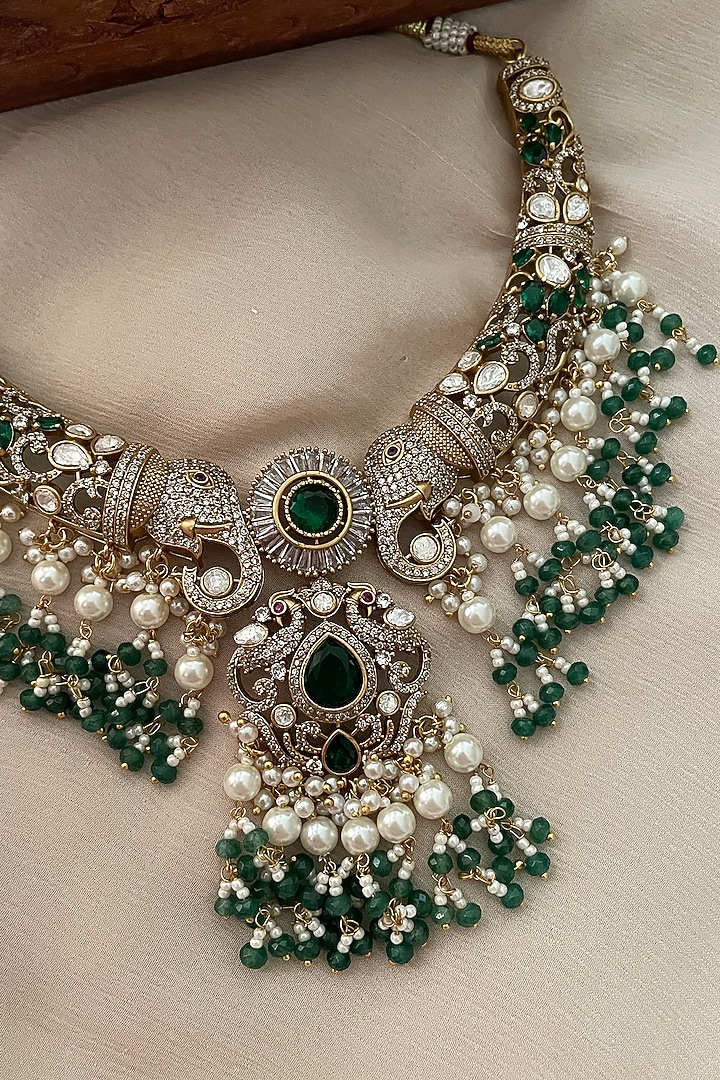 Gold Finish Kundan Polki & Emerald Stone Choker Necklace Set by Saga Jewels at Pernia's Pop Up Shop