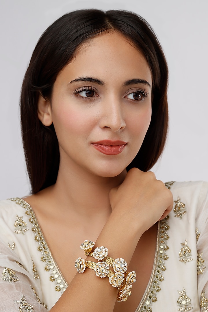 Gold Finish Punchi Bracelet by Saga Jewels at Pernia's Pop Up Shop