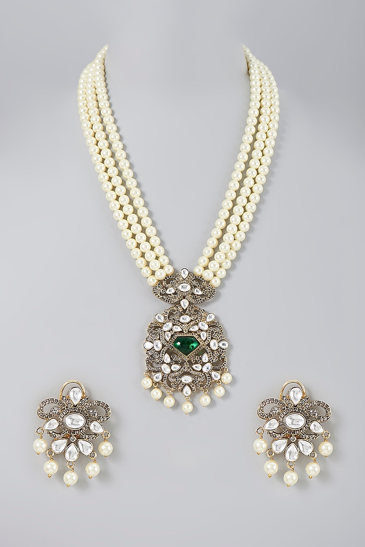 Gold Finish Pearls & Emeralds Necklace by Saga Jewels