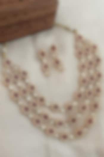 Gold Finish Kundan Polki & Ruby Layered Necklace Set by Saga Jewels at Pernia's Pop Up Shop