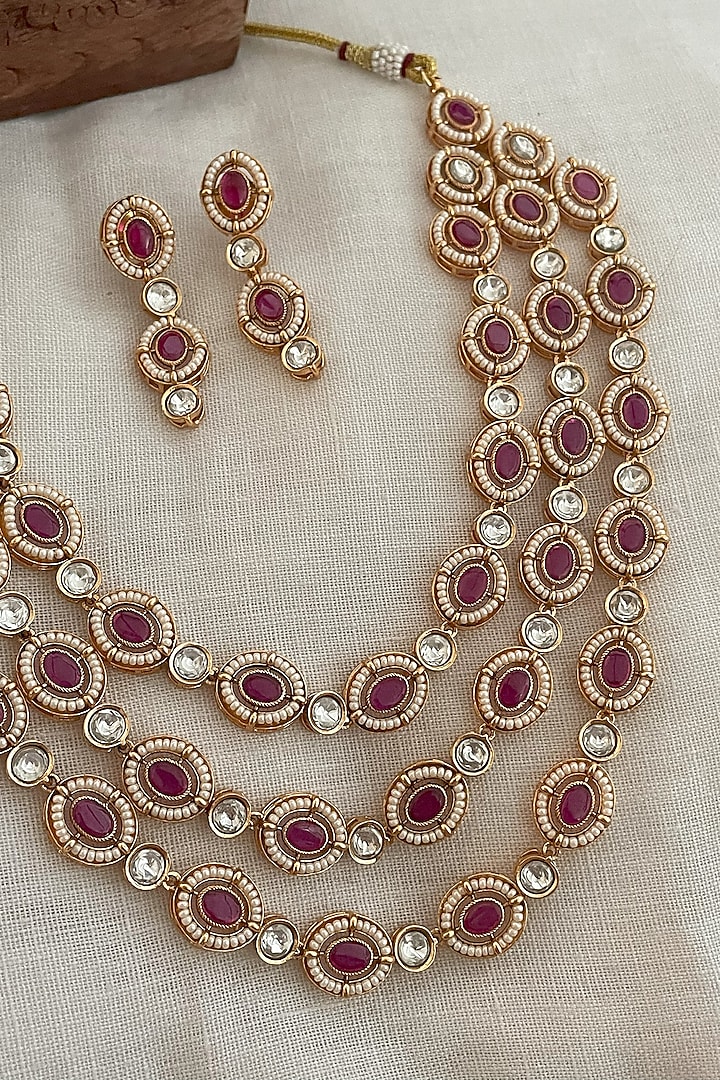 Gold Finish Kundan Polki & Ruby Layered Necklace Set by Saga Jewels at Pernia's Pop Up Shop