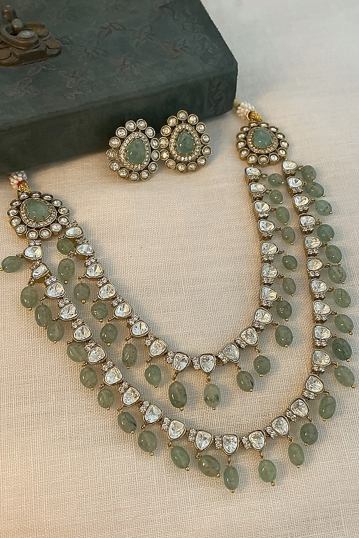 Black Rhodium Finish Kundan Polki & Emerald Layered Necklace Set by Saga Jewels at Pernia's Pop Up Shop