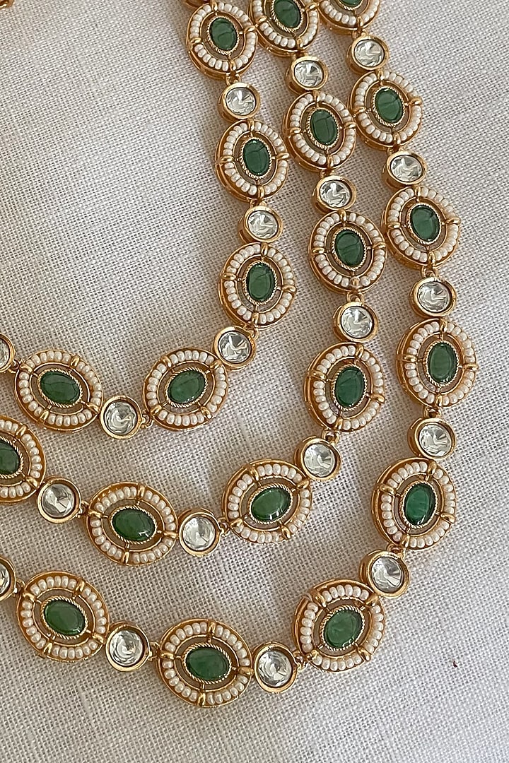 Gold Finish Kundan Polki & Emerald Layered Necklace Set by Saga Jewels at Pernia's Pop Up Shop