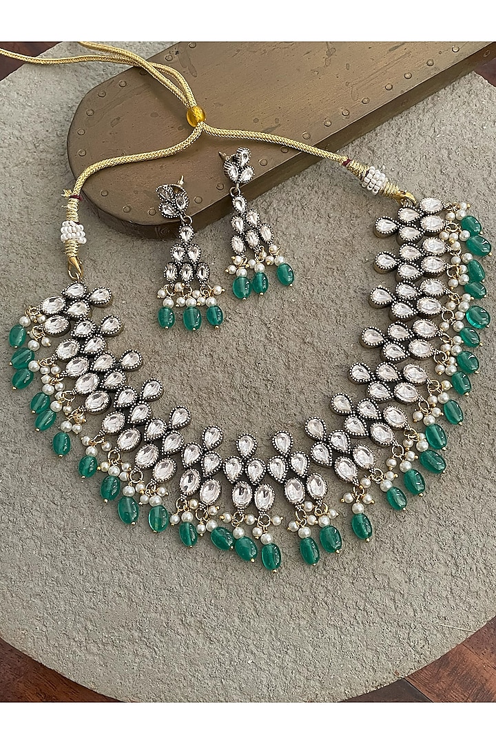 Black Rhodium Finish Kundan Polki & Emerald Stone Necklace Set by Saga Jewels at Pernia's Pop Up Shop