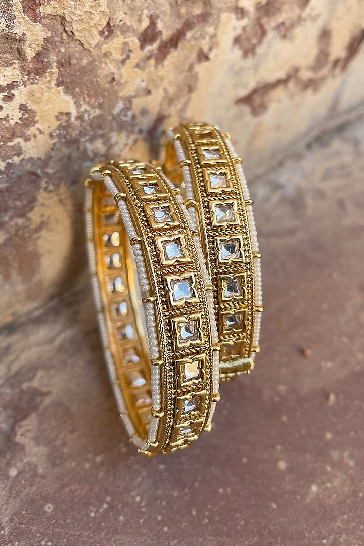 Gold Finish Kundan Polki Bangles (Set of 2) by Saga Jewels at Pernia's Pop Up Shop