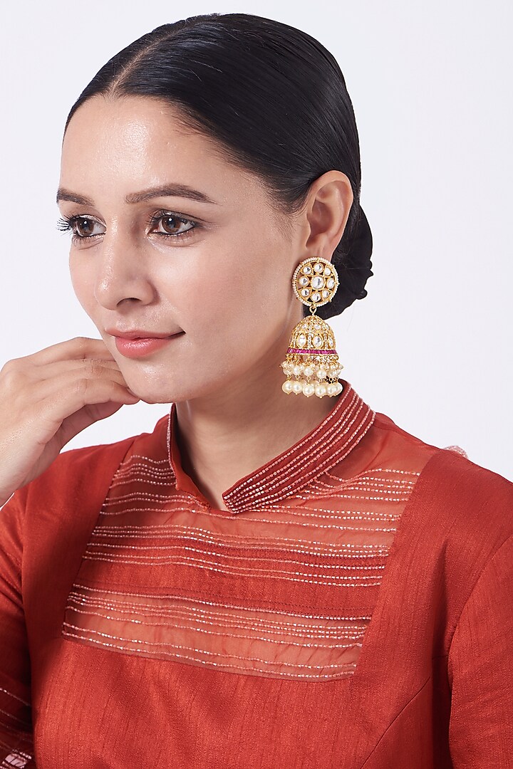 Gold Finish Ruby Red Stone Jhumka Earrings by Saga Jewels