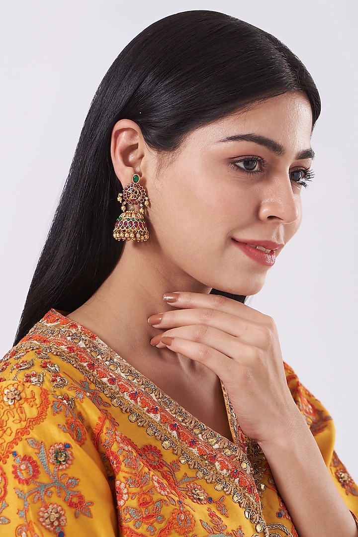 Gold Finish Pearl Temple Jhumka Earrings by Saga Jewels