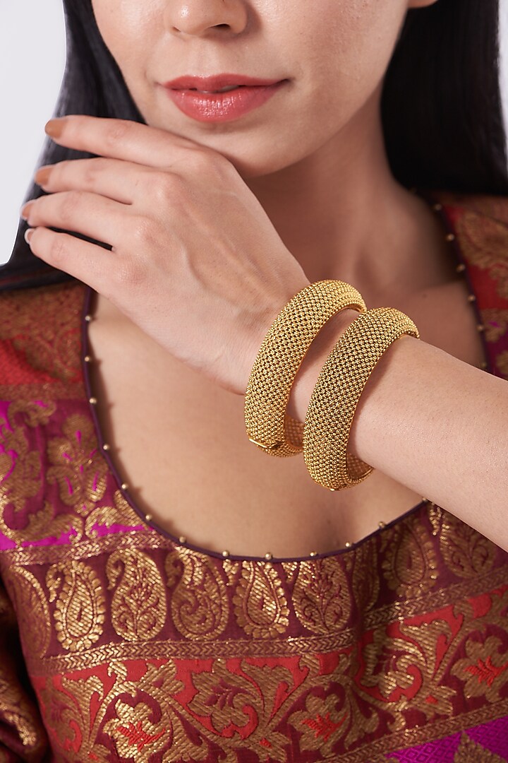 Gold Finish Openable Temple Broad Bangles (Set of 2) by Saga Jewels at Pernia's Pop Up Shop