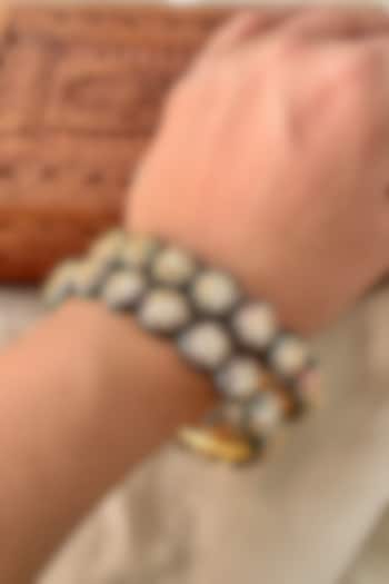 Gold Finish Kundan Polki Meenakari Bangles (Set Of 2) by Saga Jewels at Pernia's Pop Up Shop