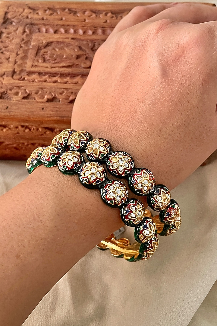 Gold Finish Kundan Polki Meenakari Bangles (Set Of 2) by Saga Jewels at Pernia's Pop Up Shop