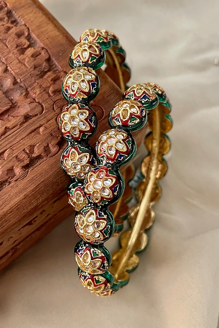 Gold Finish Kundan Polki Meenakari Bangles (Set Of 2) by Saga Jewels at Pernia's Pop Up Shop