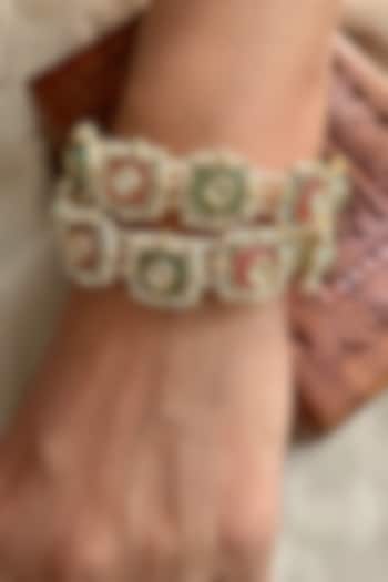 Gold Finish Pastel Stone Bangles (Set Of 2) by Saga Jewels at Pernia's Pop Up Shop