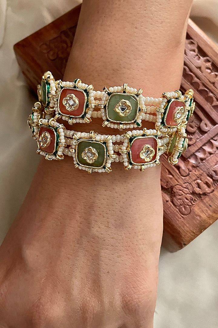 Gold Finish Pastel Stone Bangles (Set Of 2) by Saga Jewels at Pernia's Pop Up Shop