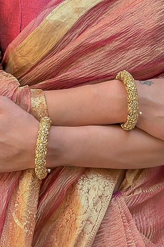 Gold Finish Temple Carved Bangles (Set Of 2) by Saga Jewels