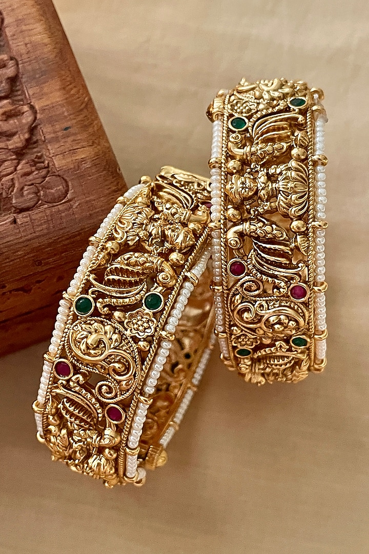 Gold Finish Temple Motif Bangles (Set Of 2) by Saga Jewels at Pernia's Pop Up Shop