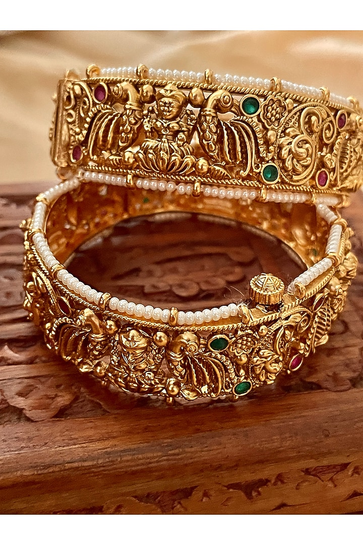 Gold Finish Temple Motif Bangles (Set Of 2) by Saga Jewels at Pernia's Pop Up Shop