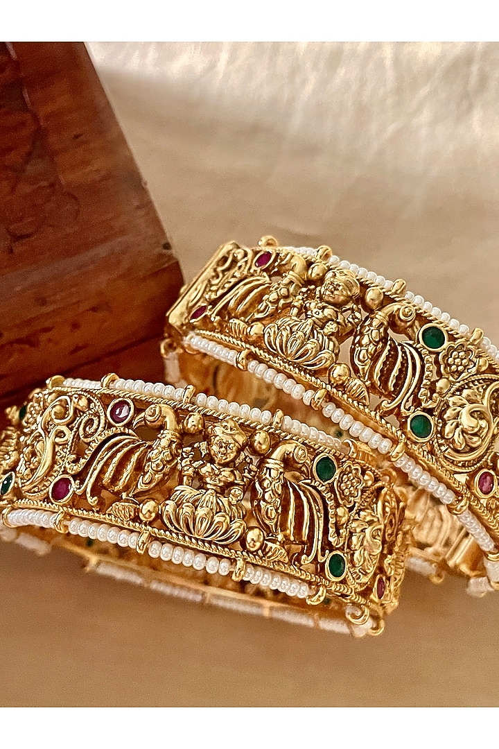 Gold Finish Temple Motif Bangles (Set Of 2) by Saga Jewels at Pernia's Pop Up Shop