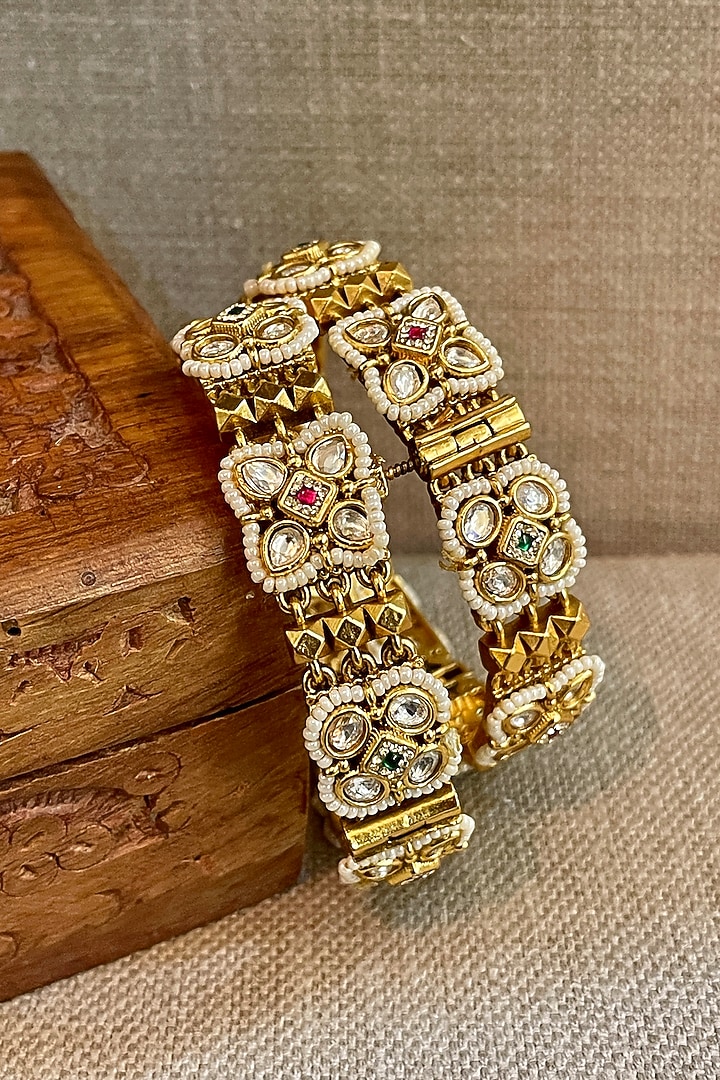 Gold Finish Temple Meshwork Bangles (Set Of 2) by Saga Jewels at Pernia's Pop Up Shop