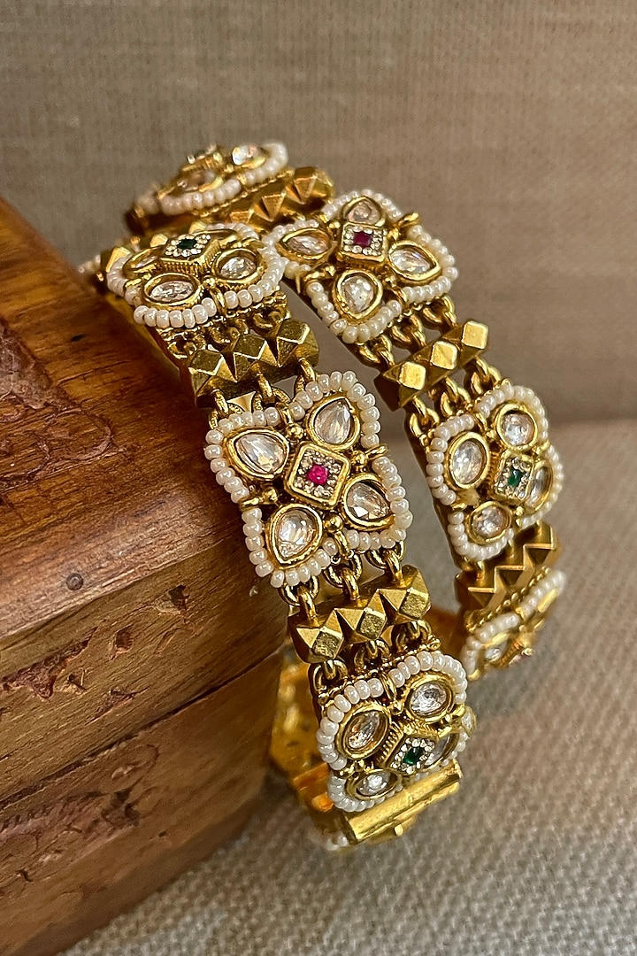 Gold Finish Temple Meshwork Bangles (Set Of 2) by Saga Jewels at Pernia's Pop Up Shop