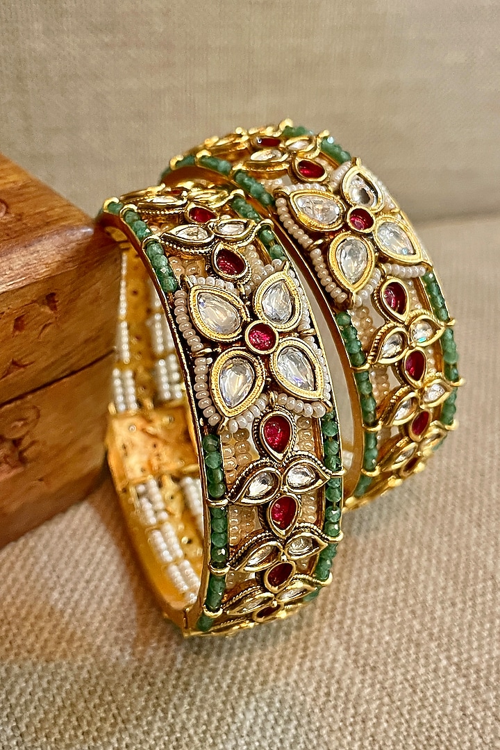 Gold Finish Multi-Colored Stone Bangles (Set Of 2) by Saga Jewels at Pernia's Pop Up Shop