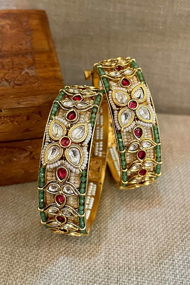 Gold Finish Multi-Colored Stone Bangles (Set Of 2) by Saga Jewels at Pernia's Pop Up Shop