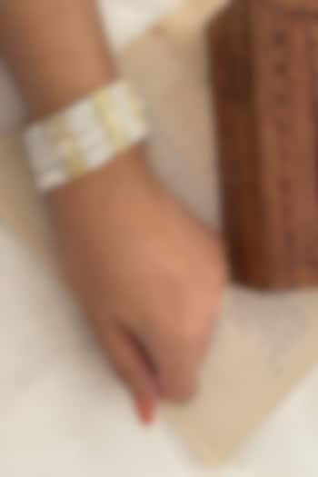 Gold Finish Pearl Bracelet by Saga Jewels at Pernia's Pop Up Shop