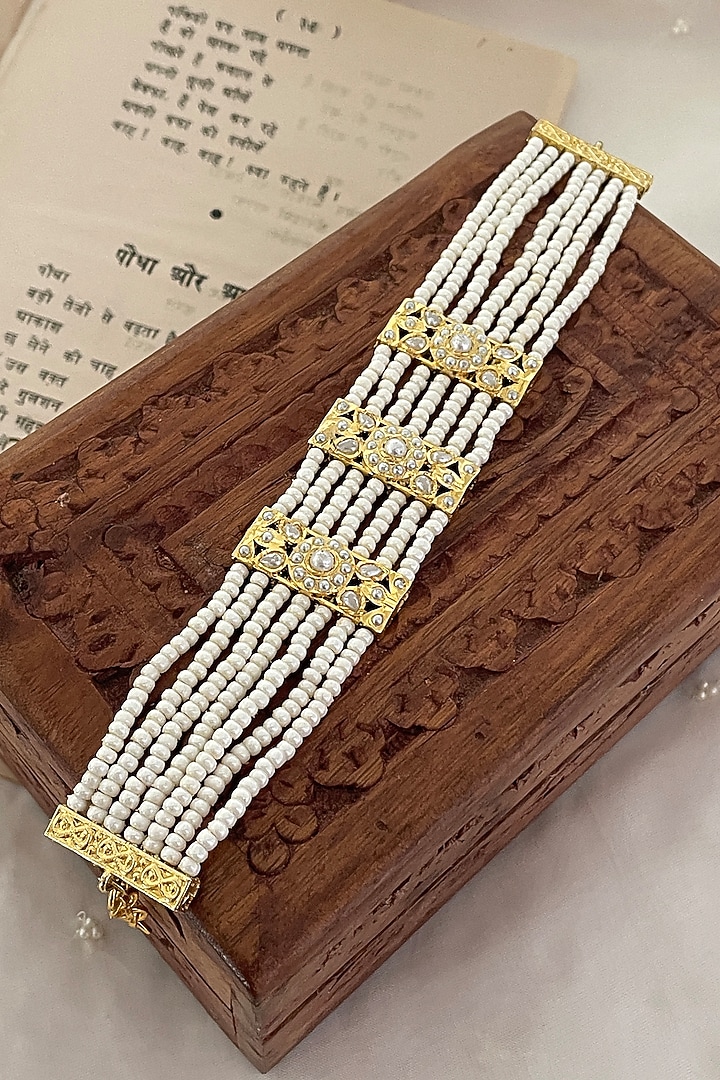 Gold Finish Pearl Bracelet by Saga Jewels at Pernia's Pop Up Shop