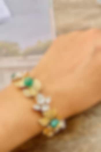 Gold Finish Leaf Motif Bracelet by Saga Jewels at Pernia's Pop Up Shop