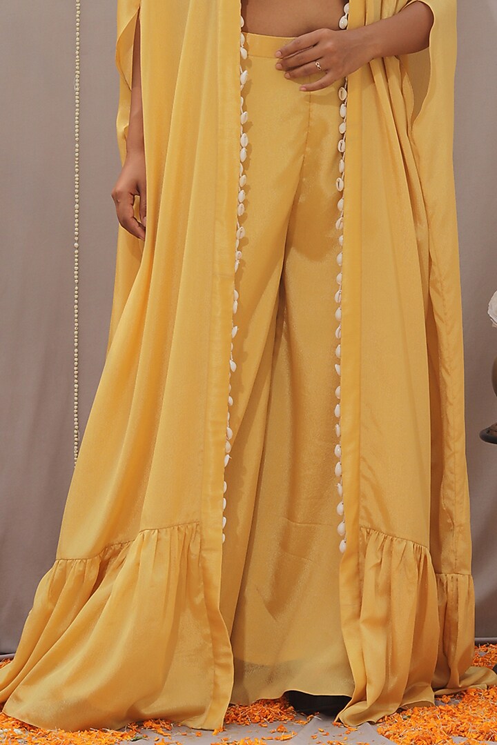 Yellow Chinon Shell Embellished Cape Set by SAINY GARG COUTURE at Pernia's Pop Up Shop