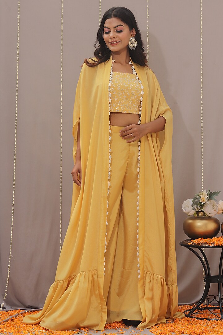 Yellow Chinon Shell Embellished Cape Set by SAINY GARG COUTURE at Pernia's Pop Up Shop