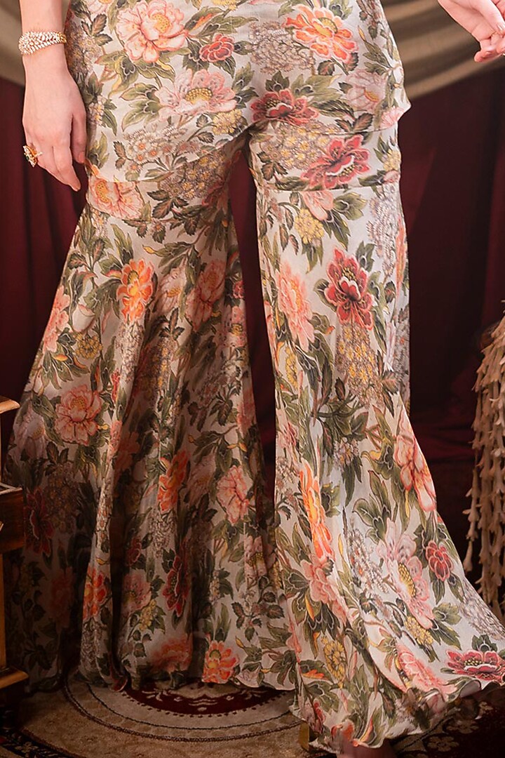 Ivory Chiffon Printed & Cutdana Embroidered Party Wear Sharara Set by SAINY GARG COUTURE at Pernia's Pop Up Shop