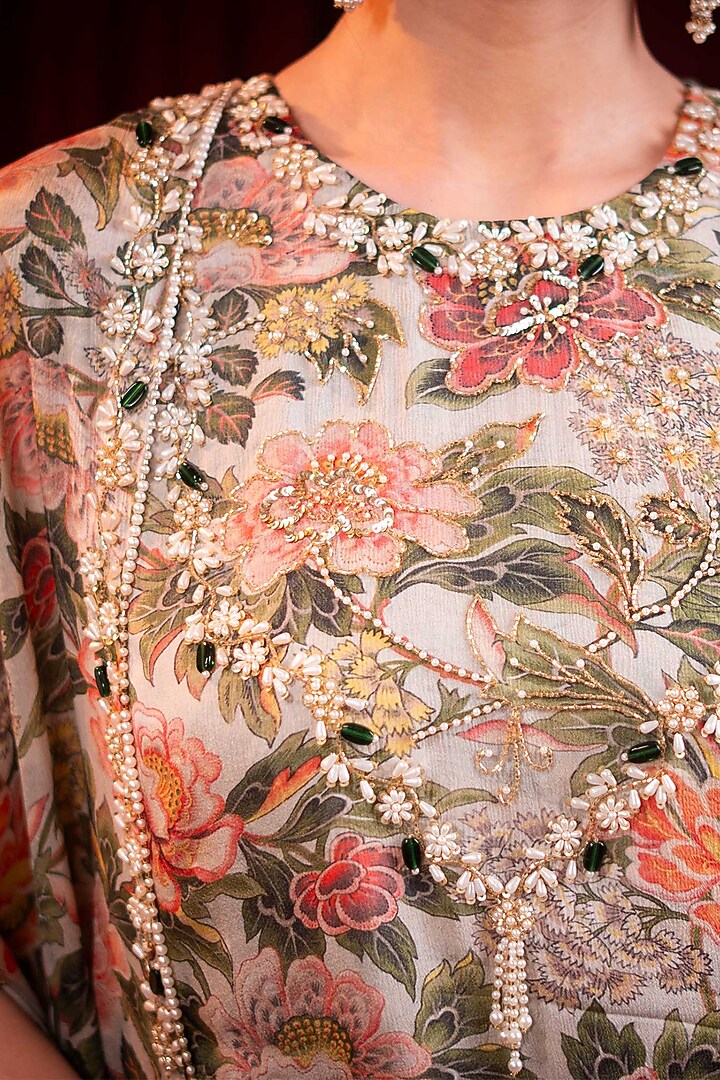 Ivory Chiffon Printed & Cutdana Embroidered Party Wear Sharara Set by SAINY GARG COUTURE at Pernia's Pop Up Shop