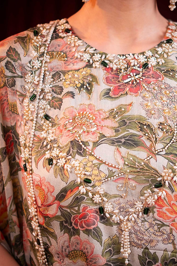 Ivory Chiffon Printed & Cutdana Embroidered Party Wear Sharara Set by SAINY GARG COUTURE at Pernia's Pop Up Shop