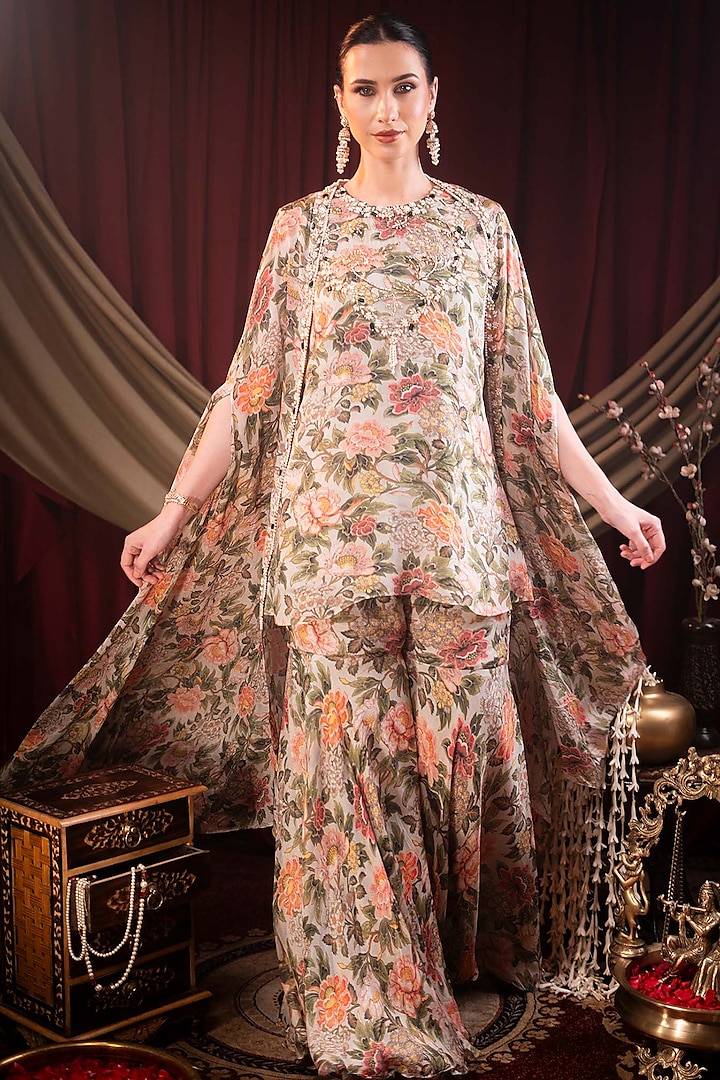 Ivory Chiffon Printed & Cutdana Embroidered Party Wear Sharara Set by SAINY GARG COUTURE at Pernia's Pop Up Shop