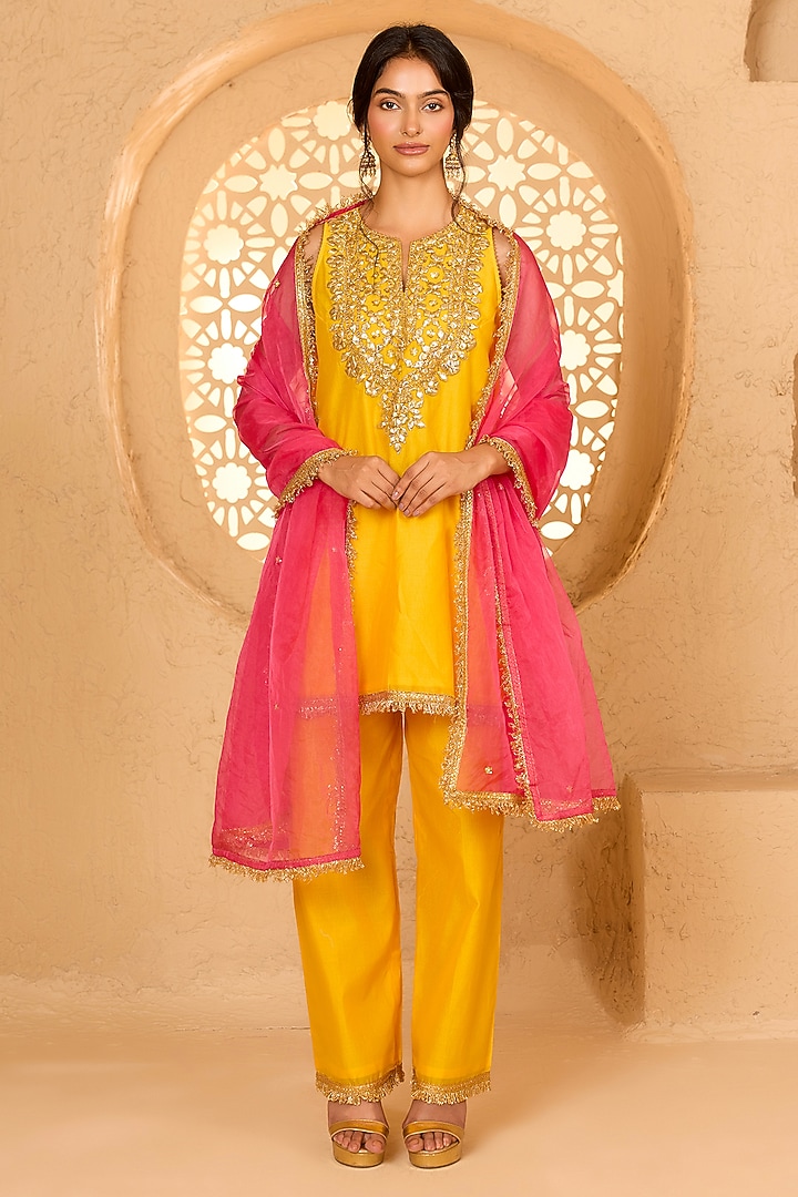 Yellow Cotton Chanderi Floral Embroidered Halter Kurta Set by saina kapoor at Pernia's Pop Up Shop