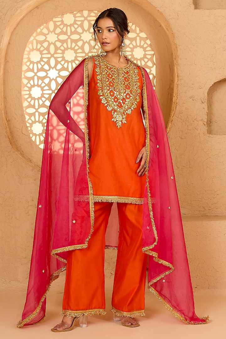 Orange Cotton Chanderi Floral Embroidered Halter Kurta Set by saina kapoor at Pernia's Pop Up Shop