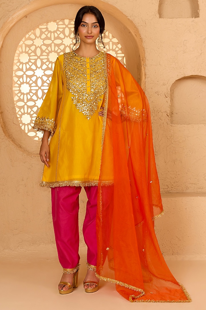 Yellow Cotton Chanderi Floral Embroidered Short Kurta Set by saina kapoor at Pernia's Pop Up Shop