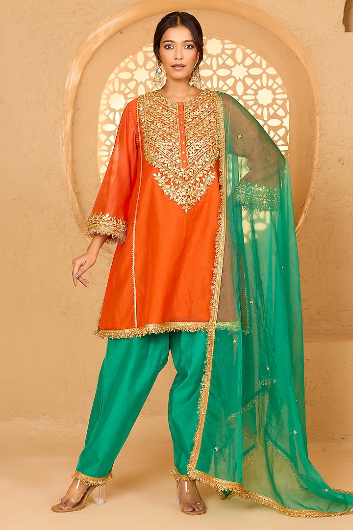 Orange Cotton Chanderi Floral Embroidered Short Kurta Set by saina kapoor at Pernia's Pop Up Shop