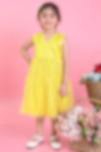 Pastel Yellow Net Printed Dress For Girls by Saka Designs