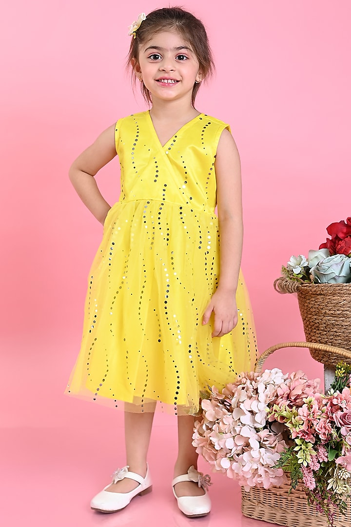 Pastel Yellow Net Printed Dress For Girls by Saka Designs