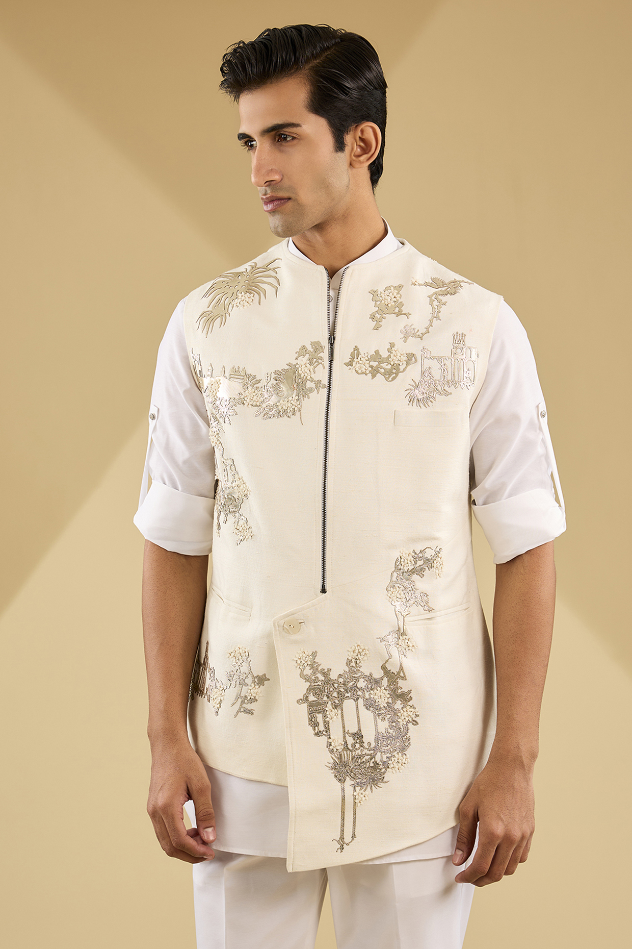 Ivory Suiting Applique Work Asymmetric Bundi Jacket by Sahil Kochhar Men