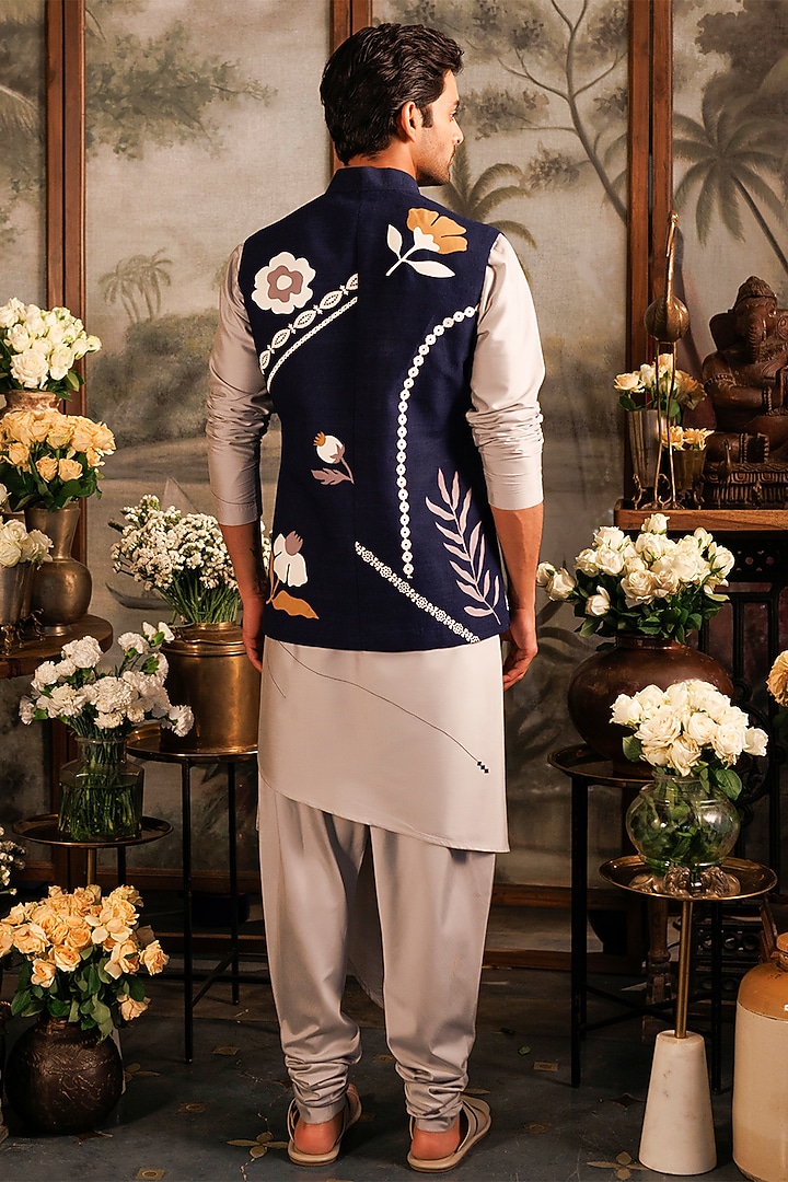Blue Matka Silk Floral Applique Work Asymmetric Bundi Jacket by Sahil Kochhar Men at Pernia's Pop Up Shop