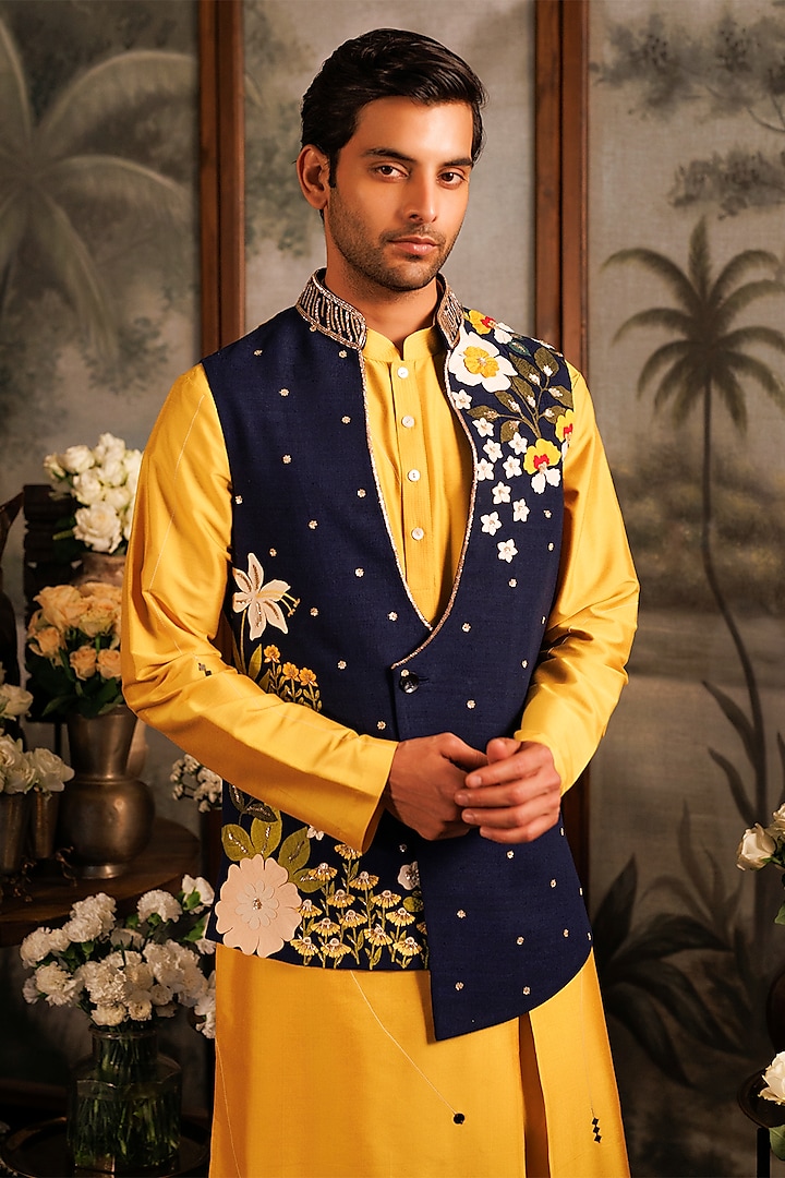 Blue Matka Silk Floral Applique Embroidered Asymmetric Bundi Jacket by Sahil Kochhar Men