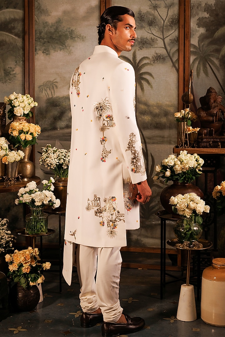 Ivory Matka Silk 3D Applique Floral Hand Embroidered Asymmetric Groom Sherwani Set by Sahil Kochhar Men at Pernia's Pop Up Shop