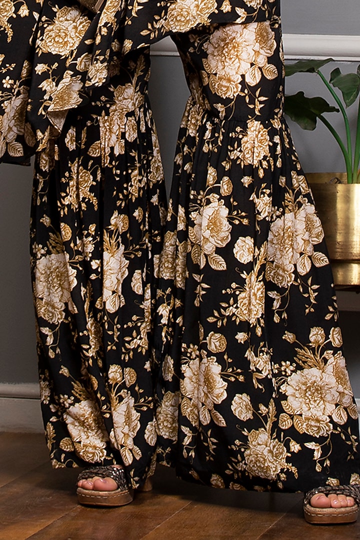 Black Crepe Floral Printed Party Wear Sharara Set by Sakshi Girri at Pernia's Pop Up Shop