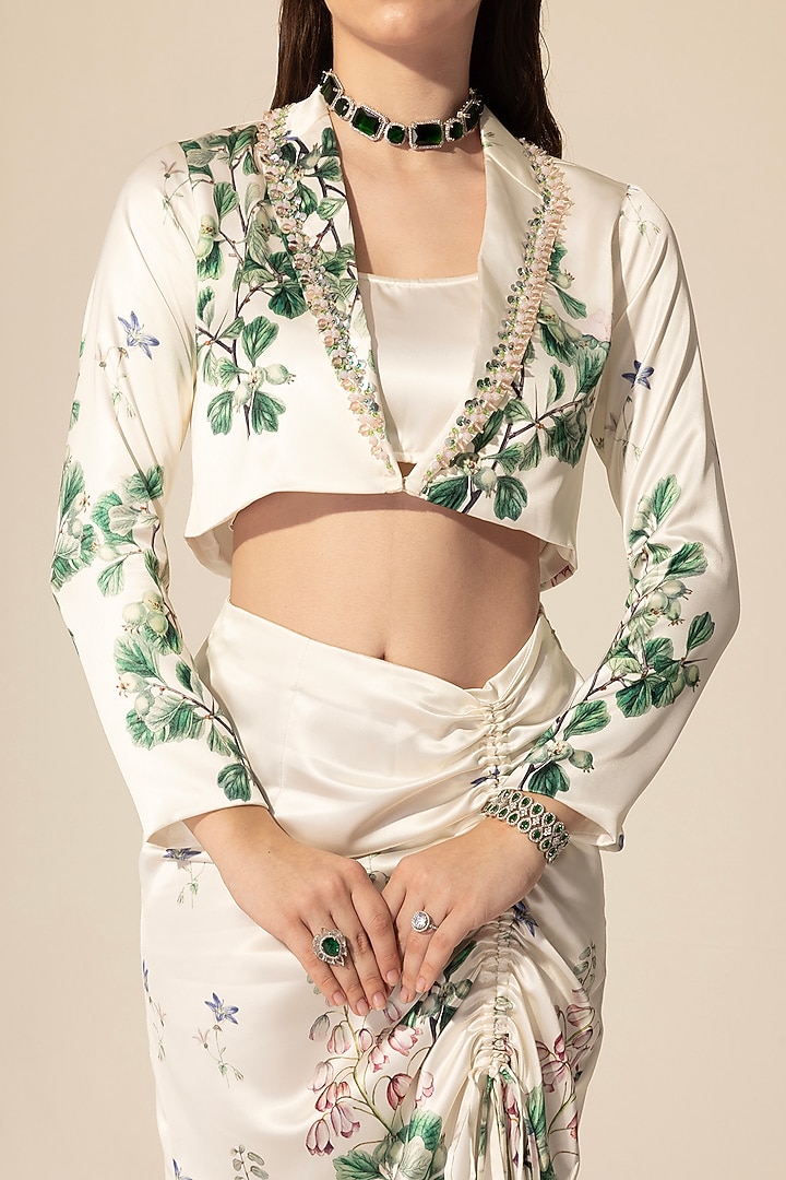 Off-White Luxe Satin Botanical Printed & Embellished Skirt Set by Sakshi Girri at Pernia's Pop Up Shop