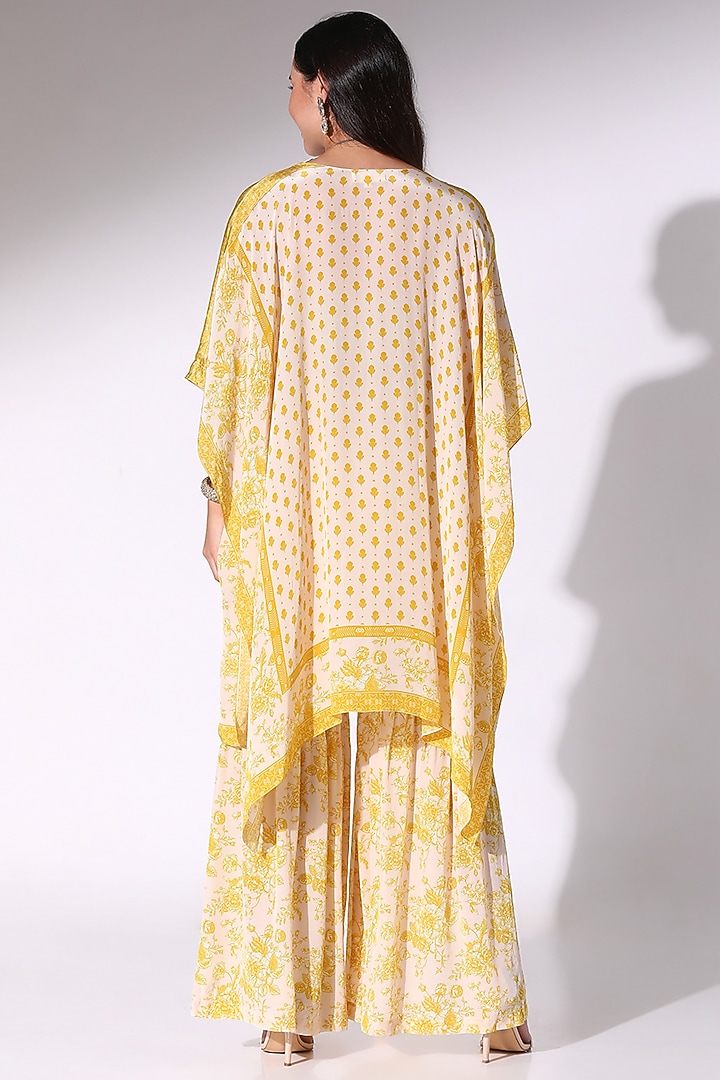 Yellow Crepe Floral Printed & Lace Embellished Kaftan Set by Sakshi Girri at Pernia's Pop Up Shop